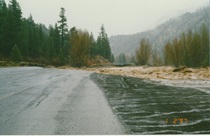 A portion of U.S. 395 in Walker Canyon is washed away by flood waters on January 2, 1997.