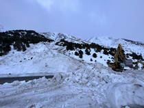 Snow and debris covers part of U.S. 395 north of Lee Vining following a series of winter avalanches. (March 2023)