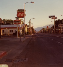 A gas station light glows in the morning light on Main Street in Bishop in 1968.