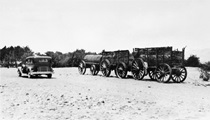 An undated black and white picture of a car and wagon in Death Valley.