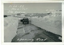 A black and white picture of a truck stopped on Monitor Pass after it opened from its winter closure on April 28, 1965.