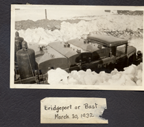A black and white image of a truck driving through snow to Bridgeport in March, 1932. Writing on the picture reads "Bridgeport or Bust. March 30, 1932."